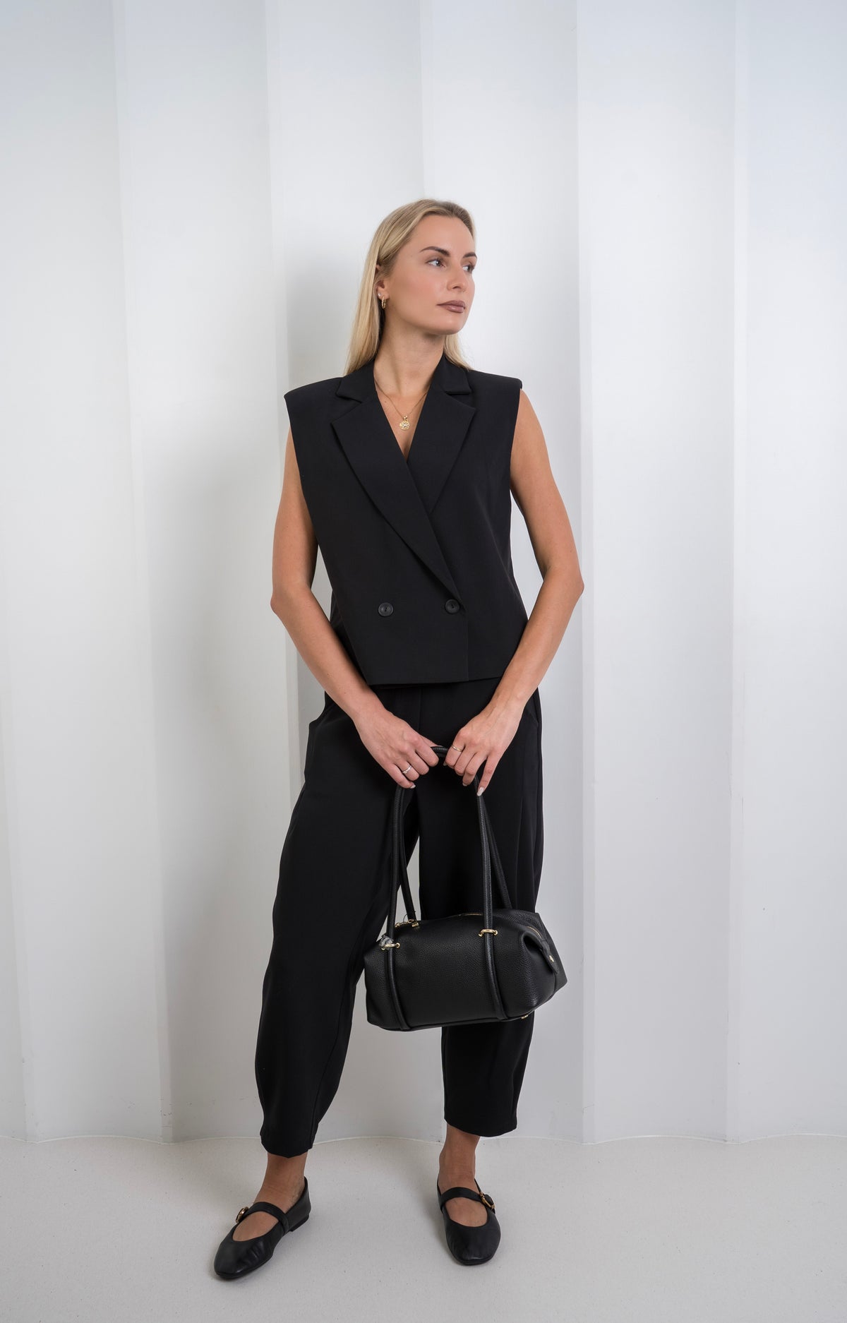 Juoda rankinė Laura Biaggi
