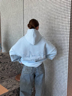 Žydras oversize džemperis “Find Me In The Waves – Blue Edition”