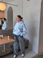 Žydras oversize džemperis “Find Me In The Waves – Blue Edition”